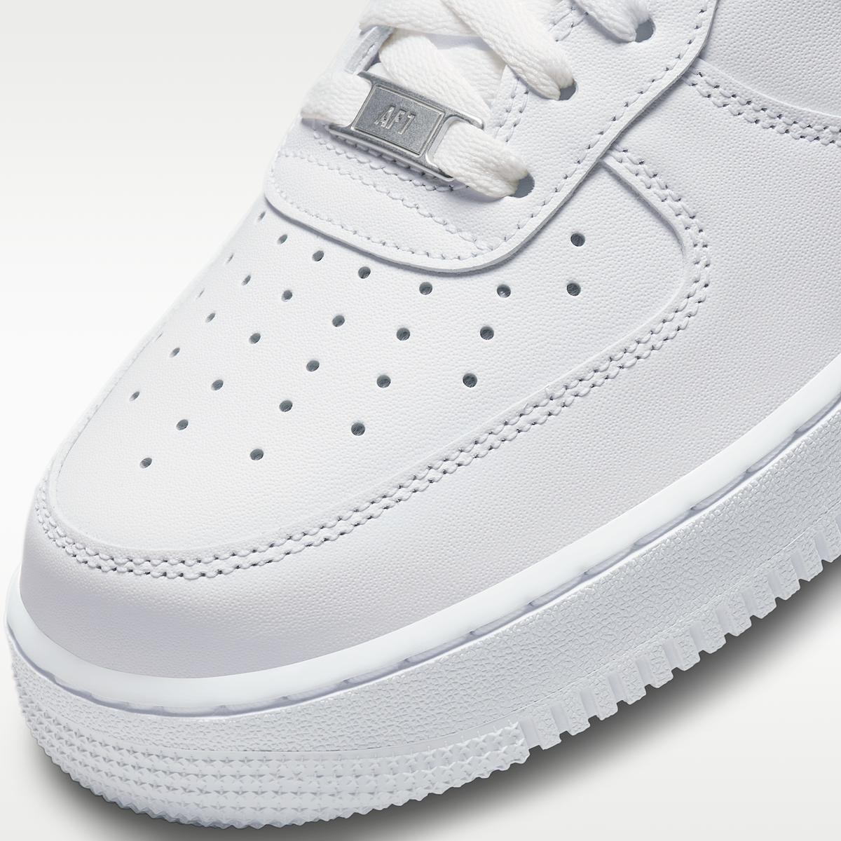 AF1 07 Triple White men's sneaker - toe and lace detail