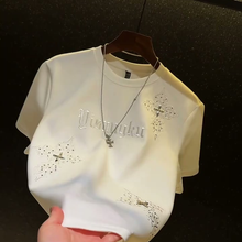 Crystal Cross Tee - silk sheen front view from product video