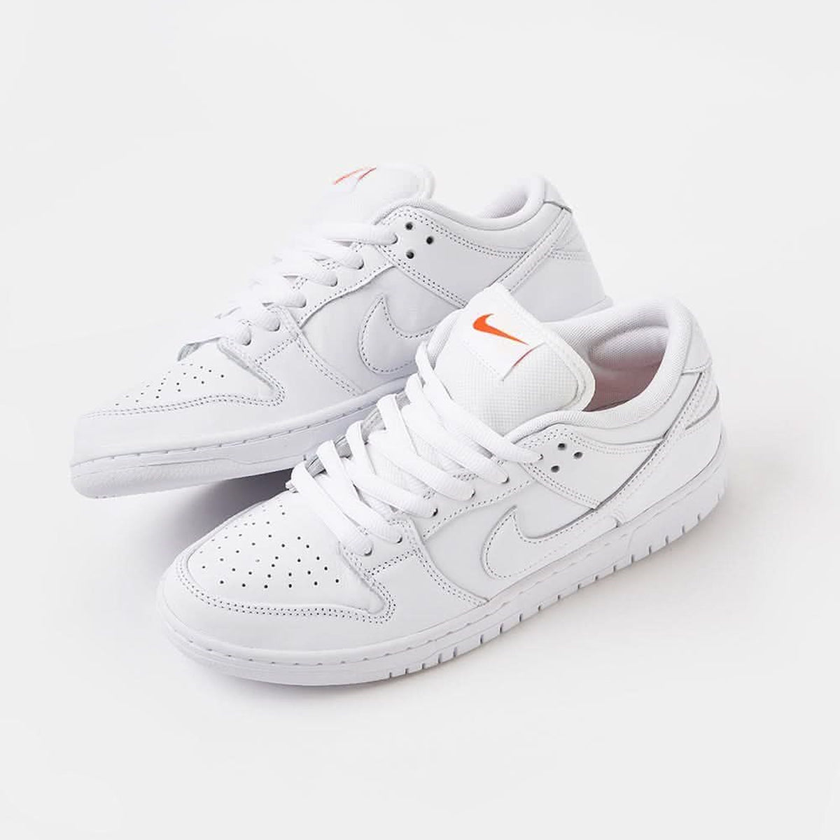 Dunk Low Pro ISO Triple White / Orange Label - Triple White / Orange Label - three-quarter pair view